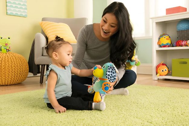Imagen de Colgante sensorial con sonido perro Boden Lamaze