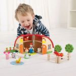 Imagen de Casa granja de madera con granjeros y animales Bigjigs